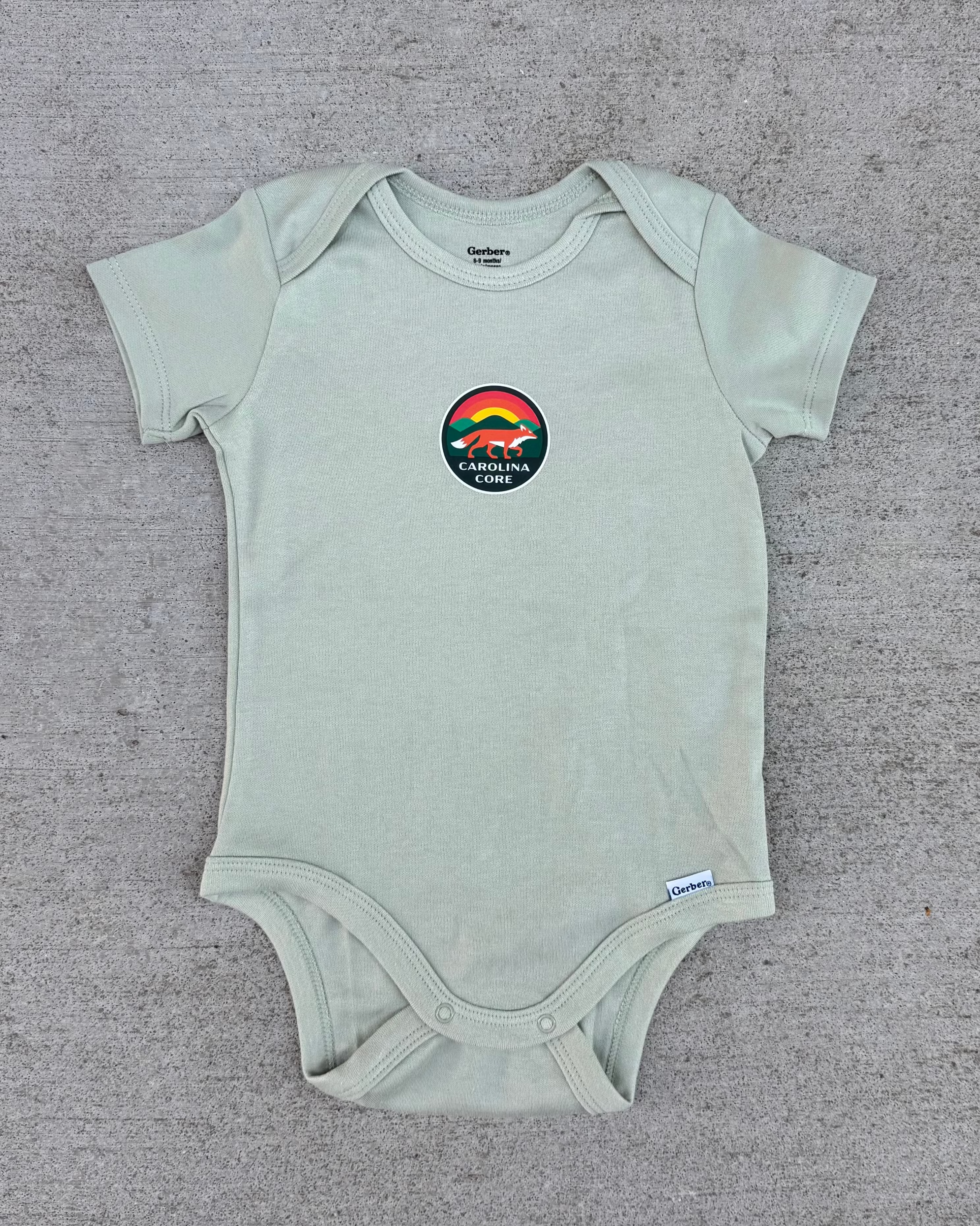 Green Logo Onesie